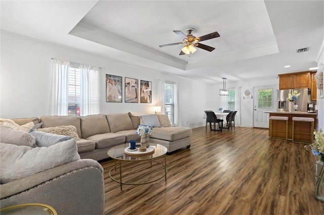 1411 Creola Axis Loop Rd, Axis, AL 36505 - living area with a raised ceiling, a ceiling fan, dark wood-style flooring, and ornamental molding