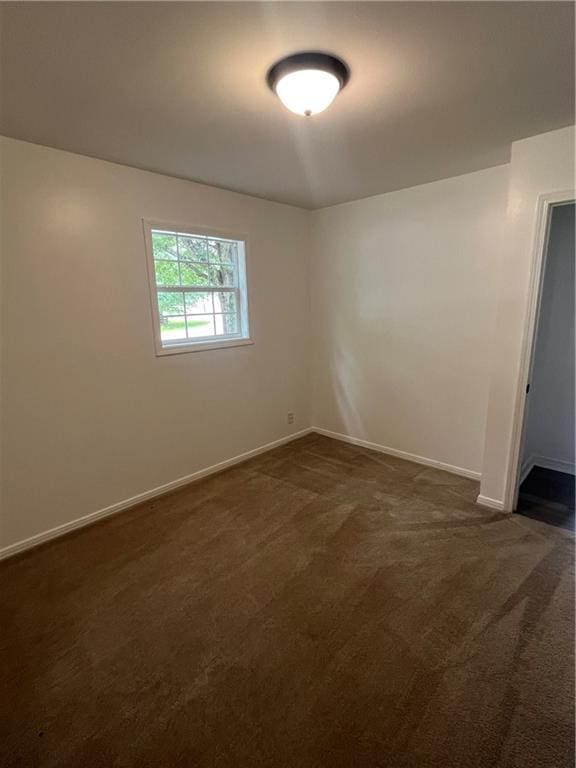 3905 Charmaine Cir E, Mobile, AL 36605 - unfurnished room featuring dark colored carpet and baseboards