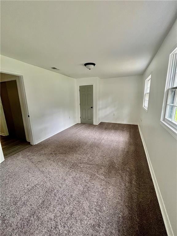 3905 Charmaine Cir E, Mobile, AL 36605 - carpeted spare room with baseboards