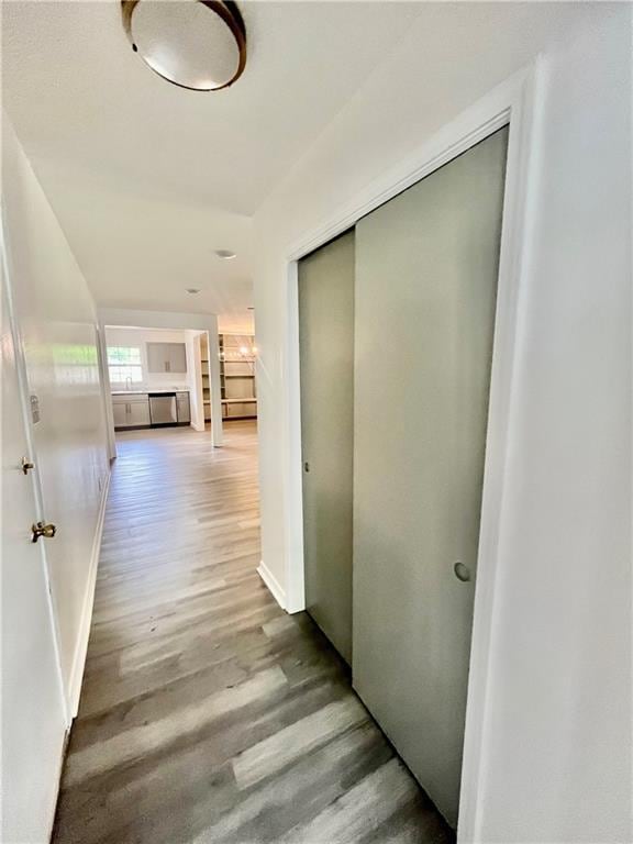 3905 Charmaine Cir E, Mobile, AL 36605 - corridor with wood finished floors and baseboards