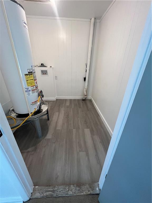 3905 Charmaine Cir E, Mobile, AL 36605 - utility room with water heater