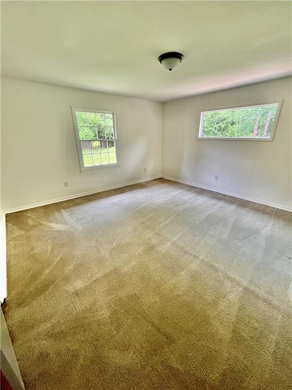 3905 Charmaine Cir E, Mobile, AL 36605 - unfurnished room featuring carpet flooring, healthy amount of natural light, and baseboards
