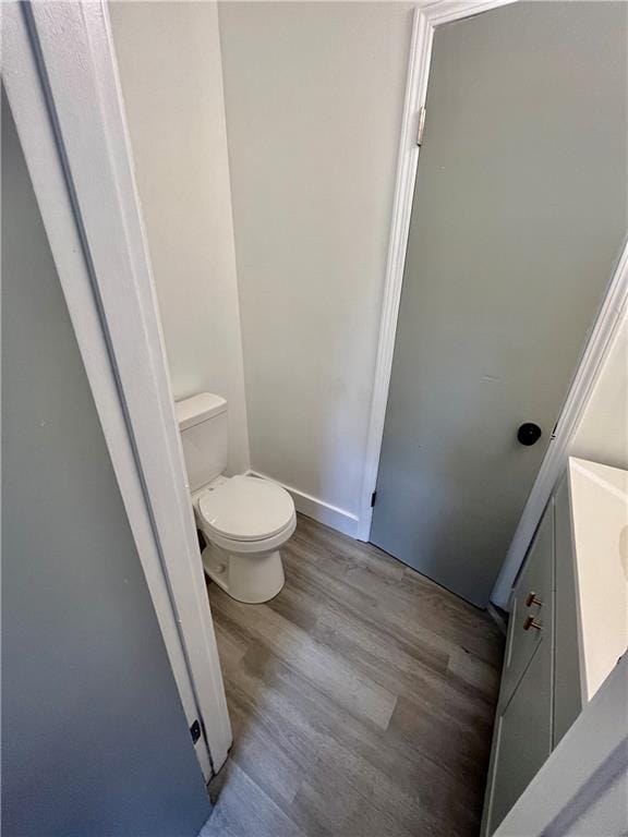 3905 Charmaine Cir E, Mobile, AL 36605 - bathroom with wood finished floors and toilet