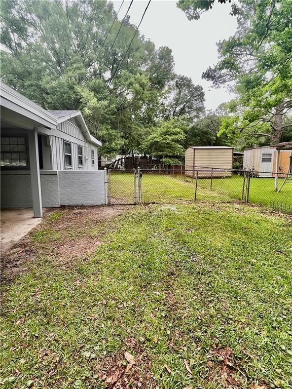 3905 Charmaine Cir E, Mobile, AL 36605 - view of yard featuring view of wooded area