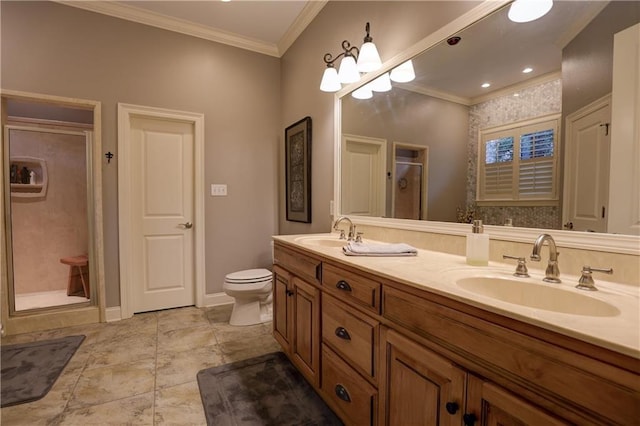 bathroom with an enclosed shower, crown molding, vanity, and toilet