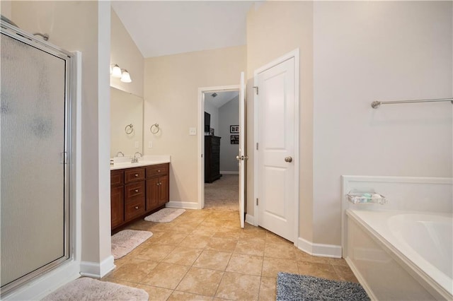 9486 Labrador Run N, Mobile, AL 36695 - full bath with a shower stall, vanity, a bath, tile patterned floors, and baseboards