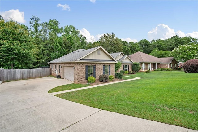 9486 Labrador Run N, Mobile, AL 36695 - view of front of property featuring concrete driveway, brick siding, and an attached garage