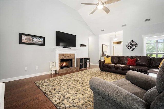 9486 Labrador Run N, Mobile, AL 36695 - living area with high vaulted ceiling, wood finished floors, ceiling fan, baseboards, and a fireplace