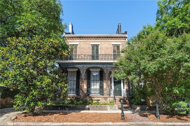 255 N Conception St, Mobile, AL 36603 - italianate house featuring covered porch and a balcony