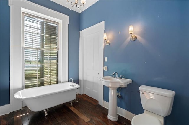 255 N Conception St, Mobile, AL 36603 - full bath with a soaking tub, hardwood / wood-style flooring, and plenty of natural light