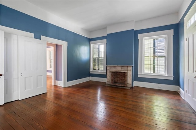 255 N Conception St, Mobile, AL 36603 - unfurnished living room with hardwood / wood-style floors and a premium fireplace