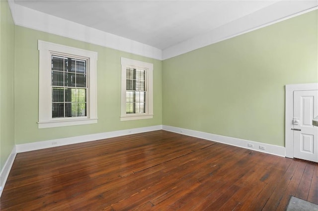 255 N Conception St, Mobile, AL 36603 - empty room with dark wood-style floors and baseboards