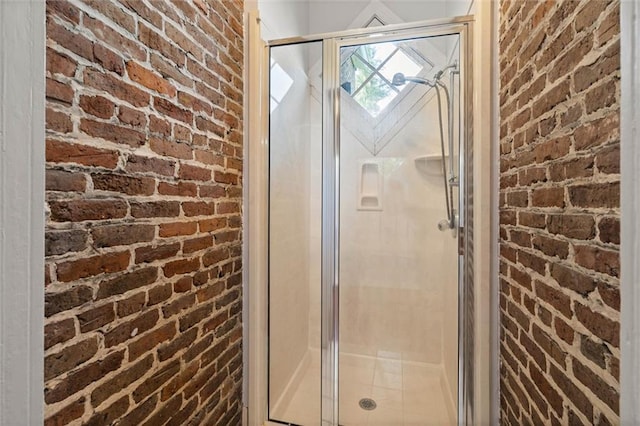 255 N Conception St, Mobile, AL 36603 - full bath featuring brick wall and a shower stall