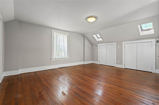255 N Conception St, Mobile, AL 36603 - additional living space featuring a skylight, lofted ceiling, and hardwood / wood-style floors