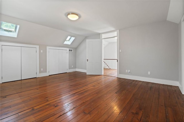 255 N Conception St, Mobile, AL 36603 - additional living space featuring a skylight, vaulted ceiling, and hardwood / wood-style flooring