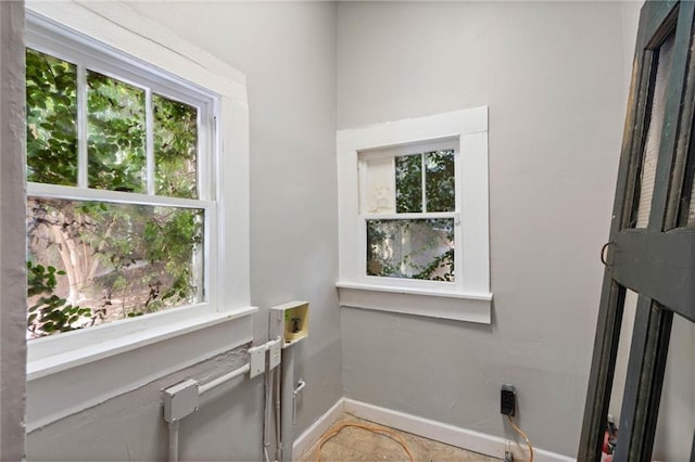 255 N Conception St, Mobile, AL 36603 - washroom featuring washer hookup, healthy amount of natural light, and electric dryer hookup