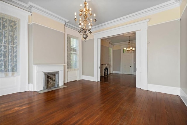 255 N Conception St, Mobile, AL 36603 - unfurnished living room featuring a chandelier, a fireplace with flush hearth, hardwood / wood-style flooring, and ornamental molding