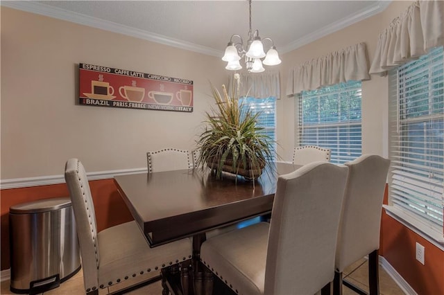 2647 Weems Dr, Mobile, AL 36607 - dining room with a chandelier and crown molding