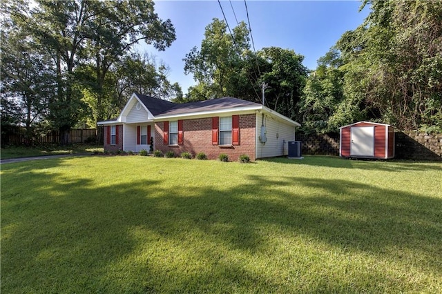 2647 Weems Dr, Mobile, AL 36607 - view of front of home featuring a storage unit and brick siding