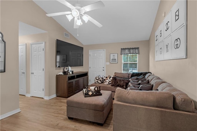 2647 Weems Dr, Mobile, AL 36607 - living room featuring a ceiling fan, light wood-type flooring, and high vaulted ceiling