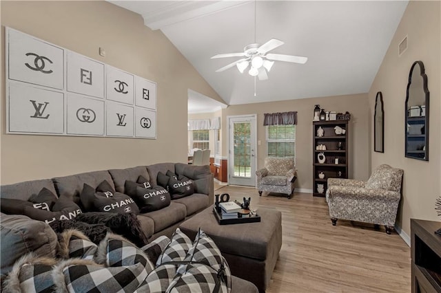 2647 Weems Dr, Mobile, AL 36607 - living room with ceiling fan, light wood-style floors, beamed ceiling, and high vaulted ceiling