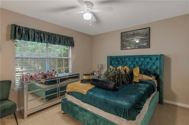 2647 Weems Dr, Mobile, AL 36607 - bedroom featuring carpet and a ceiling fan