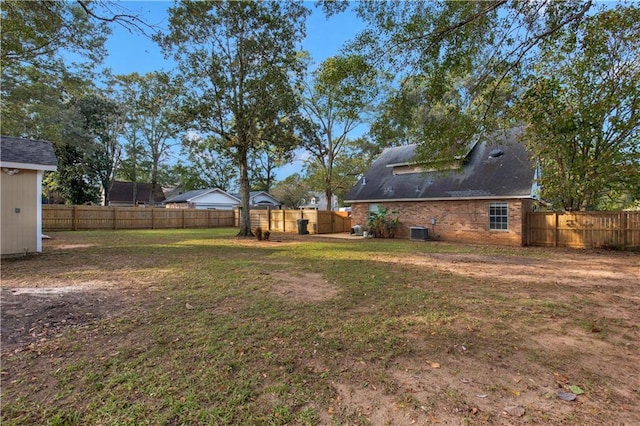 view of yard with central AC