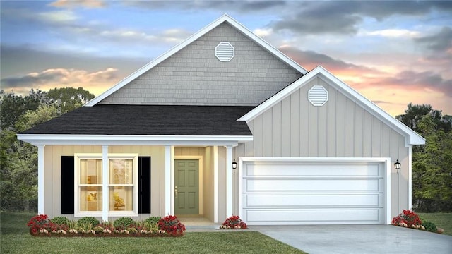 view of front of property featuring an attached garage, concrete driveway, and a shingled roof