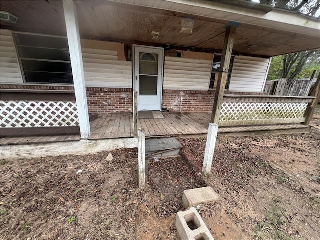 entrance to property with a porch