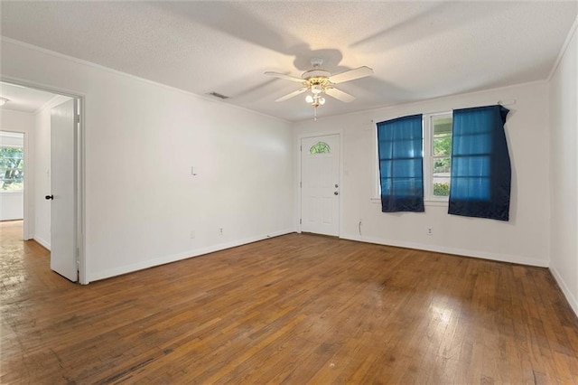 4615 Sunset Dr N, Mobile, AL 36608 - spare room with ornamental molding, hardwood / wood-style flooring, a ceiling fan, baseboards, and a textured ceiling