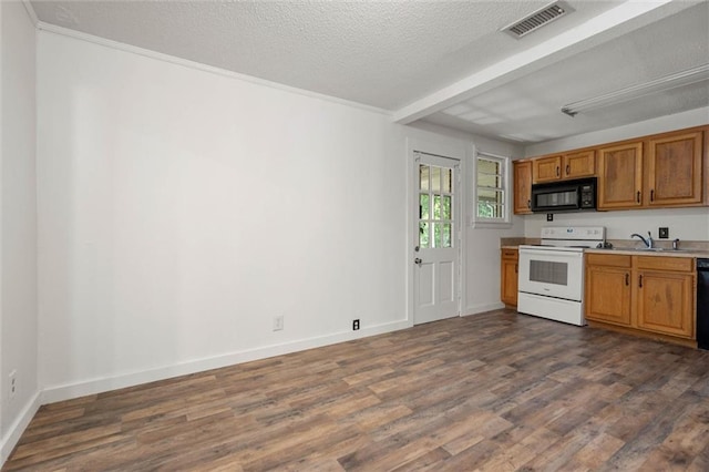 4615 Sunset Dr N, Mobile, AL 36608 - kitchen featuring black appliances, dark wood-type flooring, light countertops, a textured ceiling, and brown cabinets