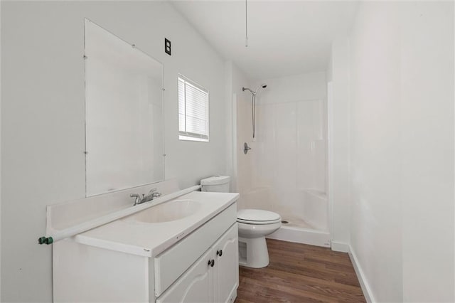 4615 Sunset Dr N, Mobile, AL 36608 - full bath featuring toilet, vanity, wood finished floors, and a shower