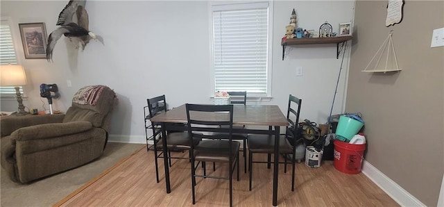 11150 Lakeside Cir, Grand Bay, AL 36541 - dining space featuring light wood-style flooring