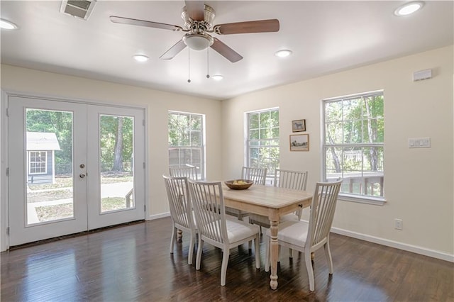 dining area with dark hardwood / wood-style flooring, ceiling fan, and french doors