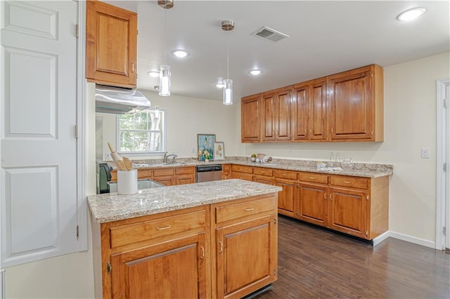 kitchen featuring pendant lighting, light stone counters, kitchen peninsula, dark hardwood / wood-style floors, and stainless steel dishwasher