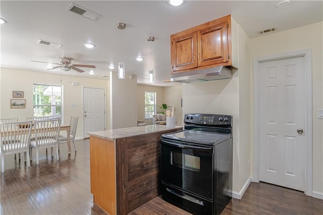 kitchen with dark wood-type flooring, plenty of natural light, black range with electric stovetop, and ceiling fan