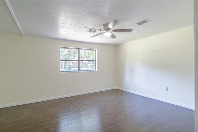 unfurnished room featuring ceiling fan and dark hardwood / wood-style floors