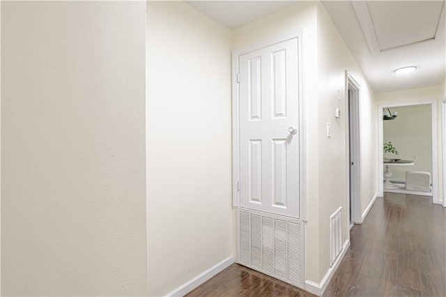 hall featuring dark wood-type flooring