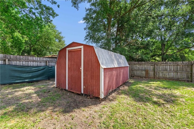 view of outdoor structure with a yard