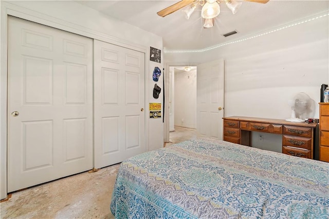 bedroom with ceiling fan and a closet