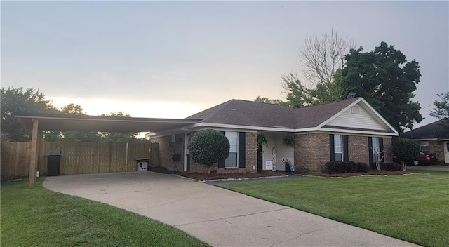 13556 James Copeland Dr, Mobile, AL 36695 - ranch-style home with brick siding, driveway, and a carport