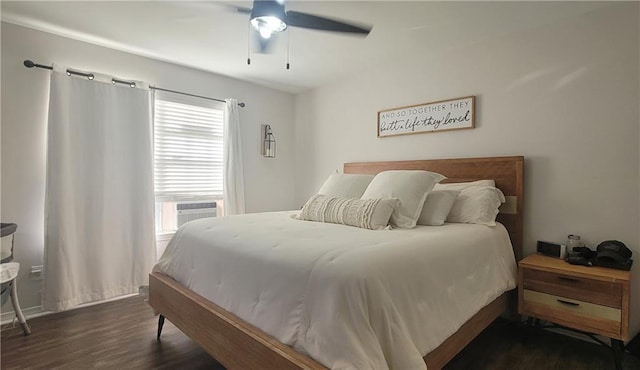 13556 James Copeland Dr, Mobile, AL 36695 - bedroom with dark wood-type flooring, cooling unit, and a ceiling fan