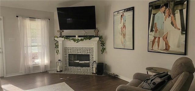 13556 James Copeland Dr, Mobile, AL 36695 - living room featuring wood finished floors and a glass covered fireplace