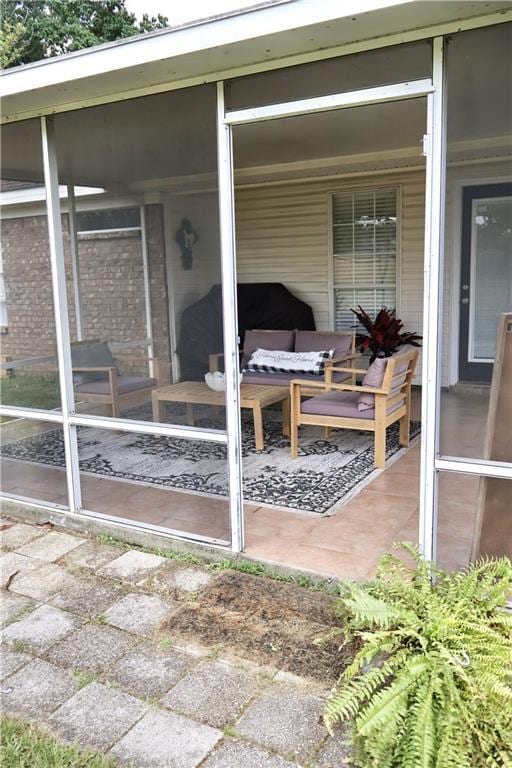 13556 James Copeland Dr, Mobile, AL 36695 - view of patio / terrace featuring a sunroom