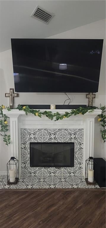 13556 James Copeland Dr, Mobile, AL 36695 - detailed view of a fireplace and wood finished floors