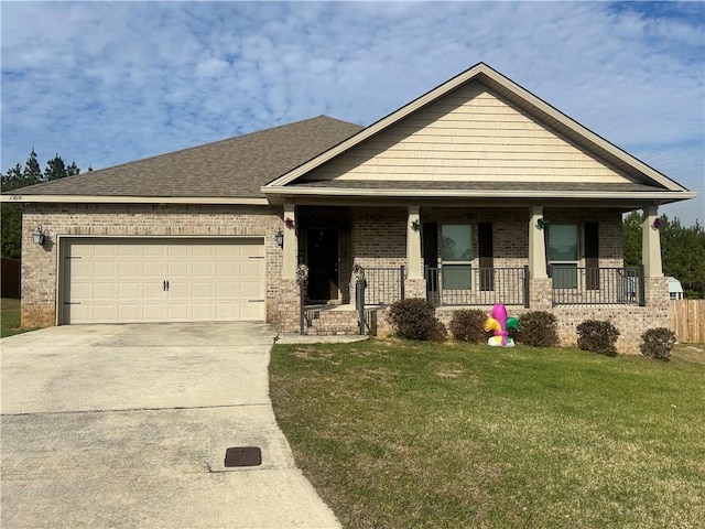 view of front of house with brick siding, covered porch, concrete driveway, a garage, and a front lawn