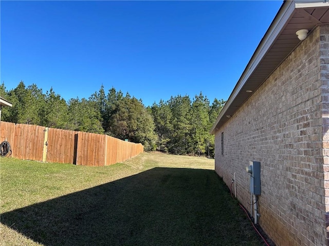 view of yard with fence