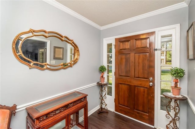 entrance foyer with baseboards, dark wood-style floors, a textured ceiling, and crown molding