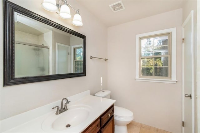 full bath with vanity, a stall shower, tile patterned flooring, toilet, and visible vents