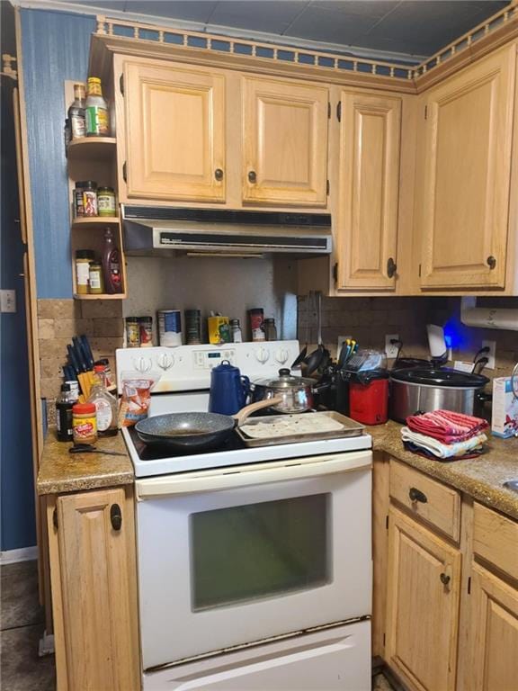 kitchen featuring light countertops, under cabinet range hood, light brown cabinetry, and white range with electric cooktop